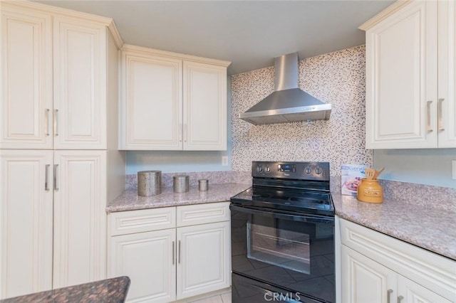 1229 Porto Grande Unit 4, Diamond Bar, CA 91765 - kitchen featuring electric range, wall chimney range hood, light stone countertops, and tile patterned floors
