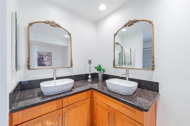 1229 Porto Grande Unit 4, Diamond Bar, CA 91765 - bathroom featuring double vanity and recessed lighting