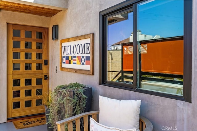5429 E The Toledo, Long Beach, CA 90803 - doorway to property with stucco siding