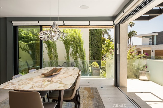 5429 E The Toledo, Long Beach, CA 90803 - sunroom featuring a chandelier