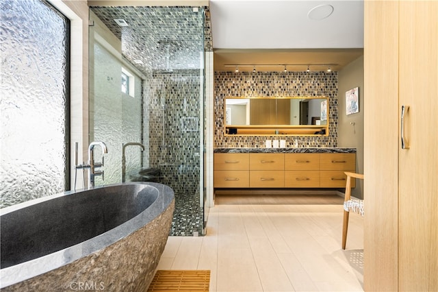 5429 E The Toledo, Long Beach, CA 90803 - full bath with a stall shower, double vanity, rail lighting, and a tub to relax in
