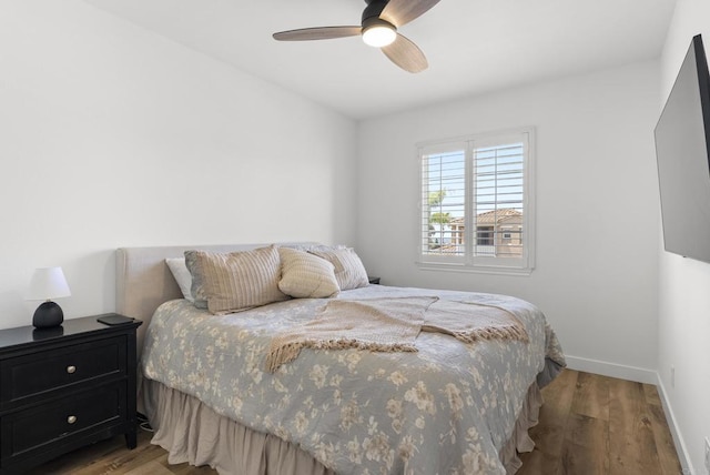 6774 Caurina Ct, Carlsbad, CA 92011 - bedroom with wood finished floors and a ceiling fan