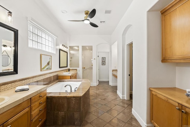 6774 Caurina Ct, Carlsbad, CA 92011 - full bath with a ceiling fan, walk in shower, a garden tub, and vanity
