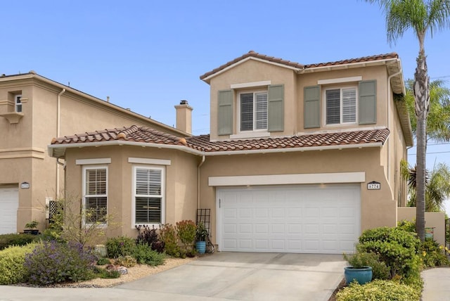6774 Caurina Ct, Carlsbad, CA 92011 - mediterranean / spanish home with stucco siding, driveway, an attached garage, and a tile roof