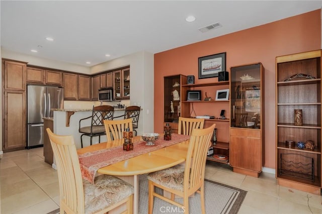 8036 Picasso, Stanton, CA 90680 - dining space featuring light tile patterned floors and recessed lighting