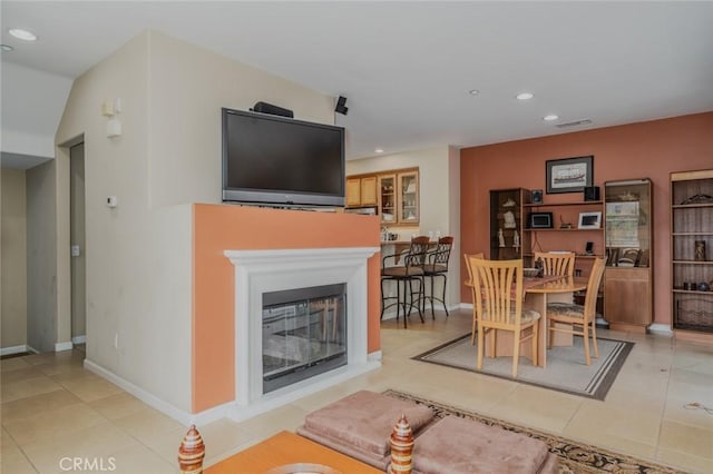 8036 Picasso, Stanton, CA 90680 - dining space featuring recessed lighting, light tile patterned floors, and a glass covered fireplace