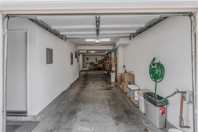 8036 Picasso, Stanton, CA 90680 - garage with electric panel and a garage door opener