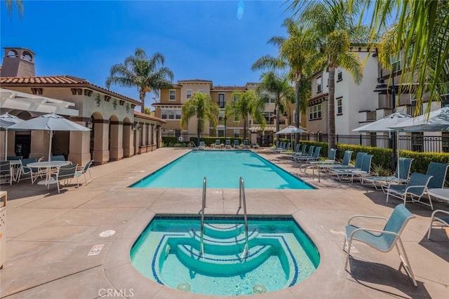 8036 Picasso, Stanton, CA 90680 - community pool with a community hot tub, a patio, and a residential view