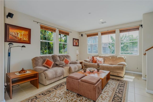 8036 Picasso, Stanton, CA 90680 - living room with healthy amount of natural light and light tile patterned floors