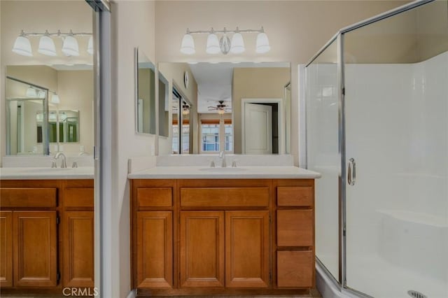8036 Picasso, Stanton, CA 90680 - bathroom featuring a stall shower, vanity, and ceiling fan