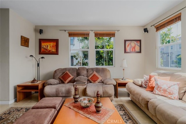 8036 Picasso, Stanton, CA 90680 - living area with healthy amount of natural light and light tile patterned floors