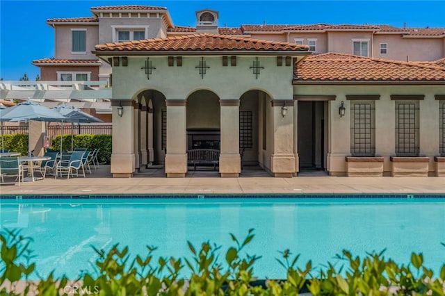 8036 Picasso, Stanton, CA 90680 - community pool featuring a patio area