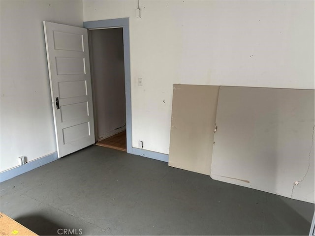 1116 S Barrington Ave, Los Angeles, CA 90049 - unfurnished room featuring concrete floors