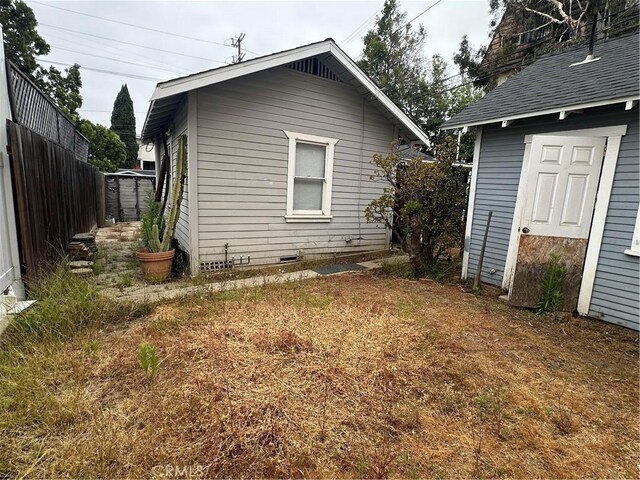 1116 S Barrington Ave, Los Angeles, CA 90049 - back of house featuring crawl space