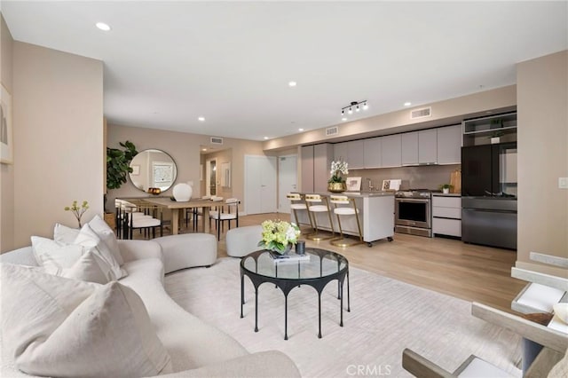 39 S Los Robles Ave Unit 5012, Pasadena, CA 91101 - living room featuring light wood-style flooring and recessed lighting