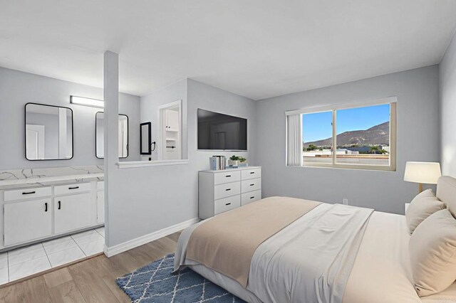 8649 Lake Murray Blvd Unit 4, San Diego, CA 92119 - bedroom featuring light wood-style floors and baseboards