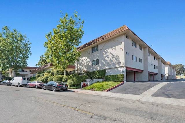 8649 Lake Murray Blvd Unit 4, San Diego, CA 92119 - view of building exterior with a residential view