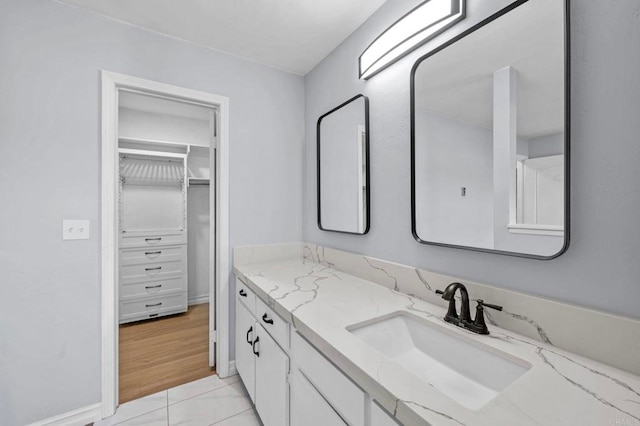 8649 Lake Murray Blvd Unit 4, San Diego, CA 92119 - bathroom featuring vanity and a walk in closet