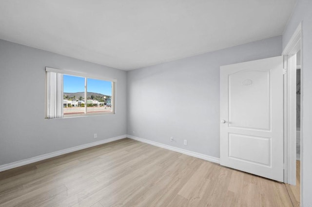 8649 Lake Murray Blvd Unit 4, San Diego, CA 92119 - spare room featuring light wood finished floors and baseboards