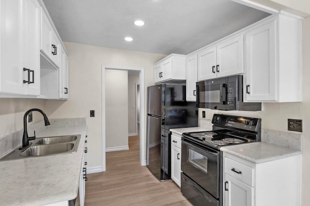 8649 Lake Murray Blvd Unit 4, San Diego, CA 92119 - kitchen featuring black appliances, light wood finished floors, white cabinetry, and recessed lighting