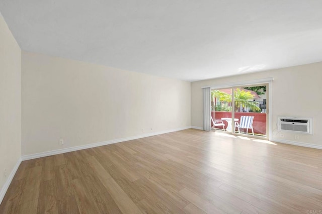 8649 Lake Murray Blvd Unit 4, San Diego, CA 92119 - unfurnished living room featuring light wood-type flooring and a wall mounted AC