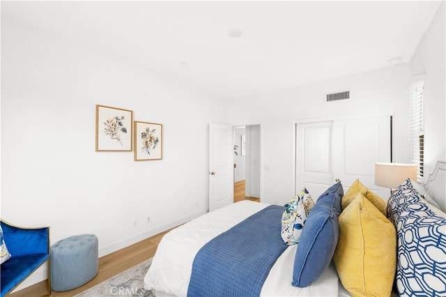 112 Velvet Leaf, Irvine, CA 92620 - bedroom featuring wood finished floors and a closet