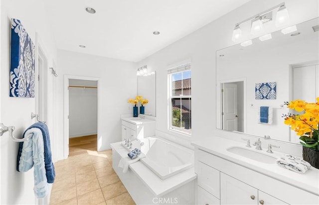 112 Velvet Leaf, Irvine, CA 92620 - full bath featuring vanity, a garden tub, tile patterned floors, a spacious closet, and recessed lighting