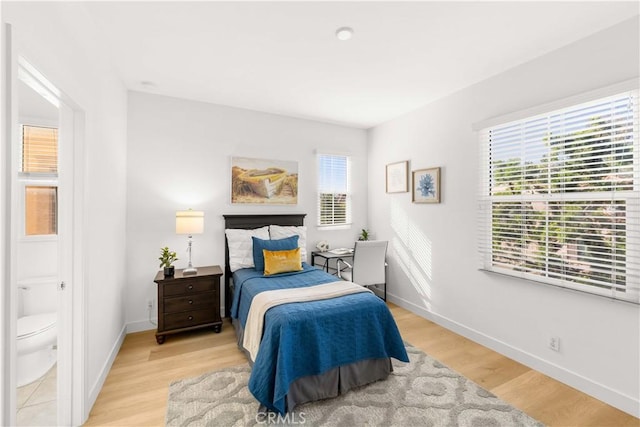 112 Velvet Leaf, Irvine, CA 92620 - bedroom featuring light wood-style flooring and ensuite bathroom