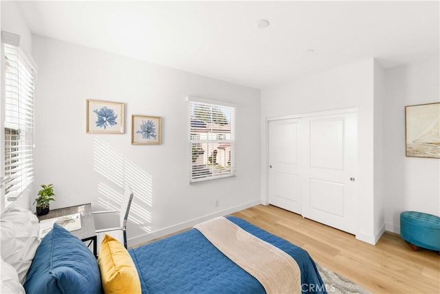112 Velvet Leaf, Irvine, CA 92620 - bedroom featuring light wood-style flooring and a closet
