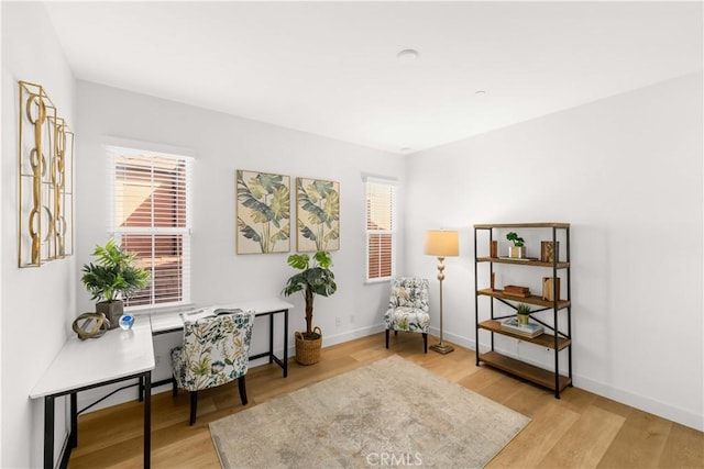 112 Velvet Leaf, Irvine, CA 92620 - living area featuring wood finished floors and healthy amount of natural light
