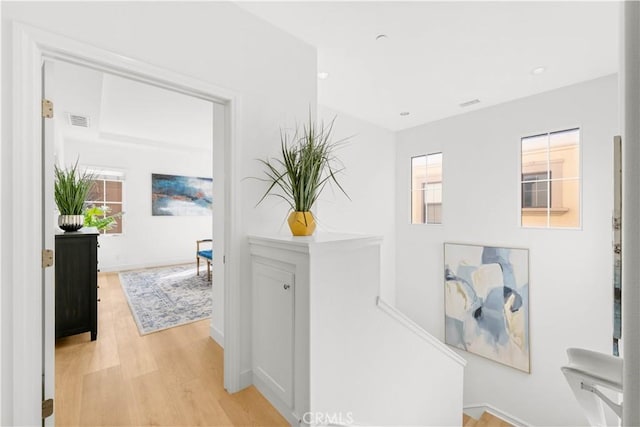 112 Velvet Leaf, Irvine, CA 92620 - corridor with light wood-style flooring and recessed lighting