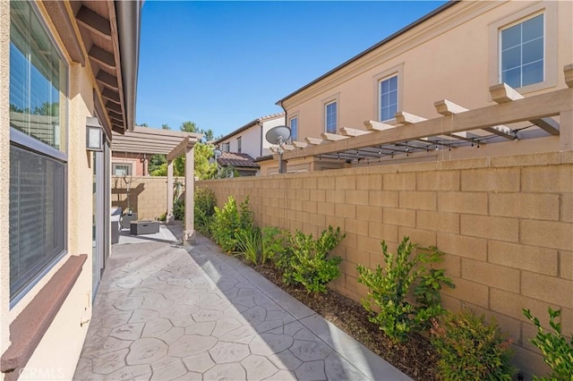 112 Velvet Leaf, Irvine, CA 92620 - fenced backyard with a pergola and a patio area