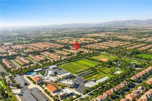 112 Velvet Leaf, Irvine, CA 92620 - aerial overview of property's location with nearby suburban area and mountains