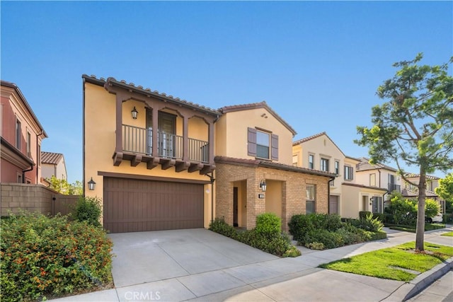 112 Velvet Leaf, Irvine, CA 92620 - mediterranean / spanish-style home with a balcony, a garage, driveway, and stucco siding