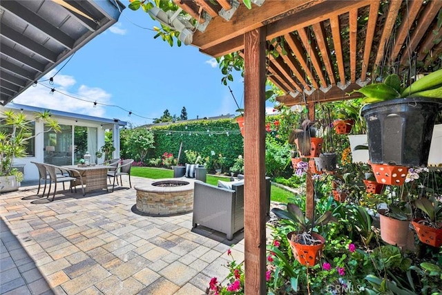 10912 Nighthawk Cir, Fountain Valley, CA 92708 - view of patio / terrace with a fire pit and outdoor dining area