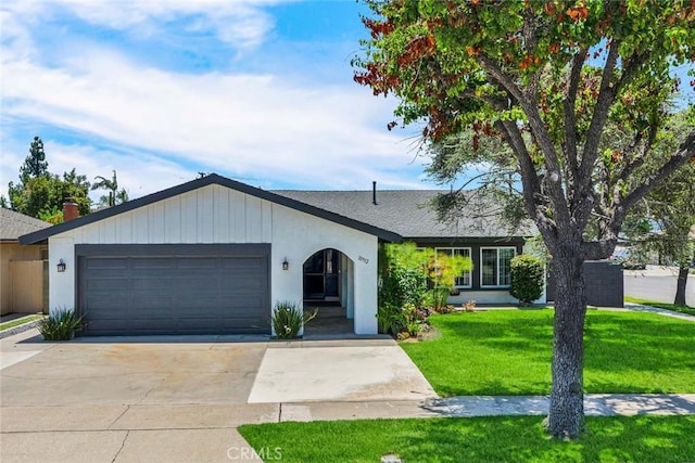 10912 Nighthawk Cir, Fountain Valley, CA 92708 - single story home featuring a garage, a front lawn, driveway, stucco siding, and roof with shingles