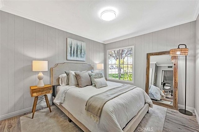 10912 Nighthawk Cir, Fountain Valley, CA 92708 - bedroom featuring ornamental molding and wood finished floors