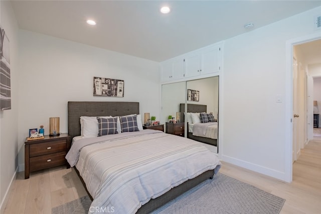 6535 Comanche Ave, Winnetka, CA 91306 - bedroom with light wood-type flooring, recessed lighting, and a closet