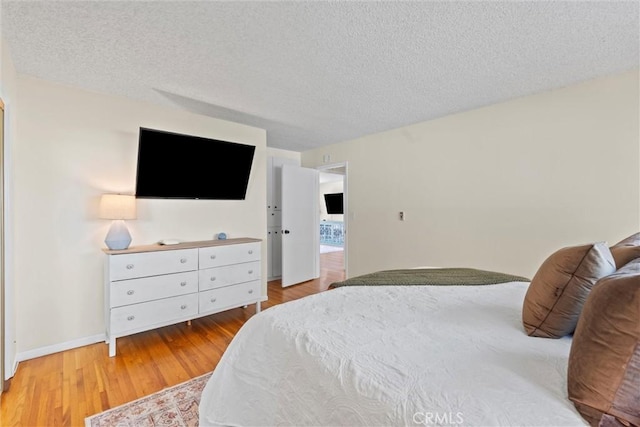 5160 Atherton Unit 73, Long Beach, CA 90815 - bedroom featuring wood finished floors and a textured ceiling