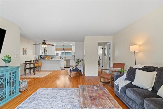 5160 Atherton Unit 73, Long Beach, CA 90815 - living area featuring light wood-style flooring and ceiling fan