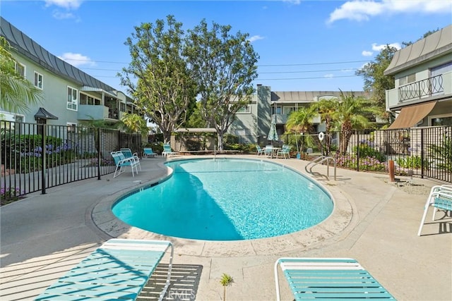 5160 Atherton Unit 73, Long Beach, CA 90815 - community pool featuring a patio and a residential view