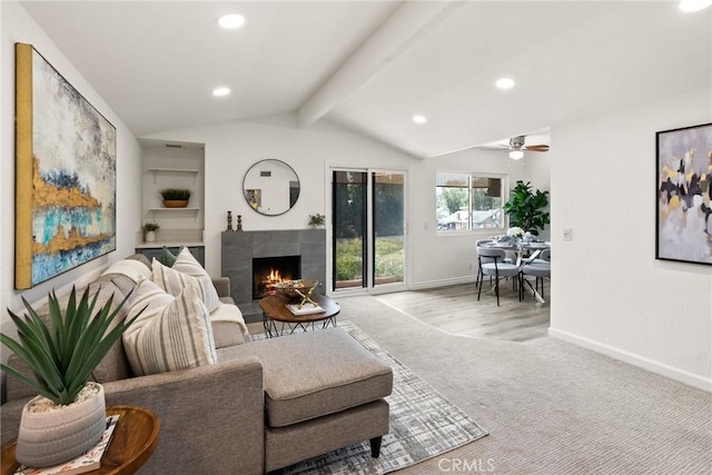 560 N Brea Blvd Unit 24, Brea, CA 92821 - carpeted living room featuring a tiled fireplace, a ceiling fan, and recessed lighting