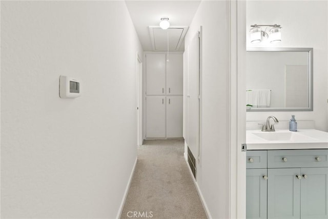560 N Brea Blvd Unit 24, Brea, CA 92821 - hall with attic access and light colored carpet