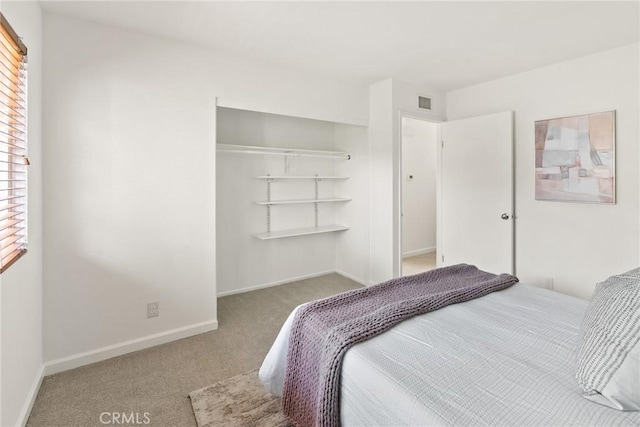 560 N Brea Blvd Unit 24, Brea, CA 92821 - carpeted bedroom with baseboards