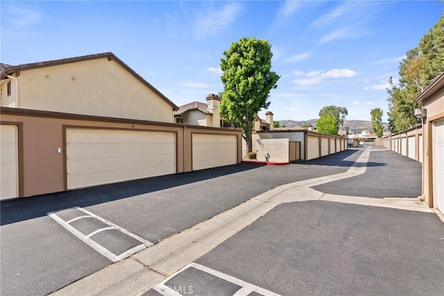 560 N Brea Blvd Unit 24, Brea, CA 92821 - view of asphalt road with community garages
