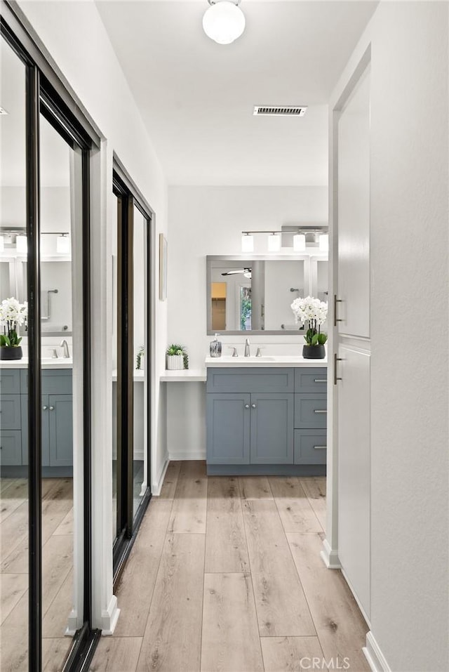 560 N Brea Blvd Unit 24, Brea, CA 92821 - bathroom featuring vanity and wood finished floors
