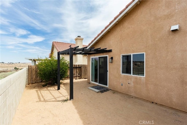 13432 Jubilee Pl, Victorville, CA 92395 - fenced backyard with a pergola and a patio