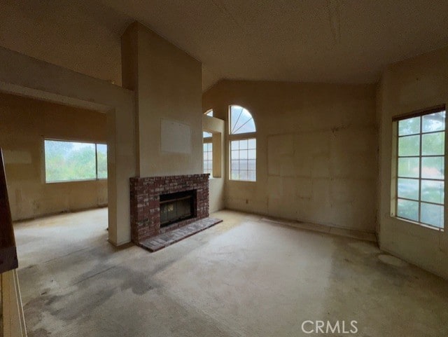 4773 Mount Rainier St, Jurupa Valley, CA 92509 - unfurnished living room with plenty of natural light, carpet floors, and a fireplace