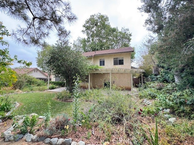 4773 Mount Rainier St, Jurupa Valley, CA 92509 - rear view of house with stucco siding and a tiled roof