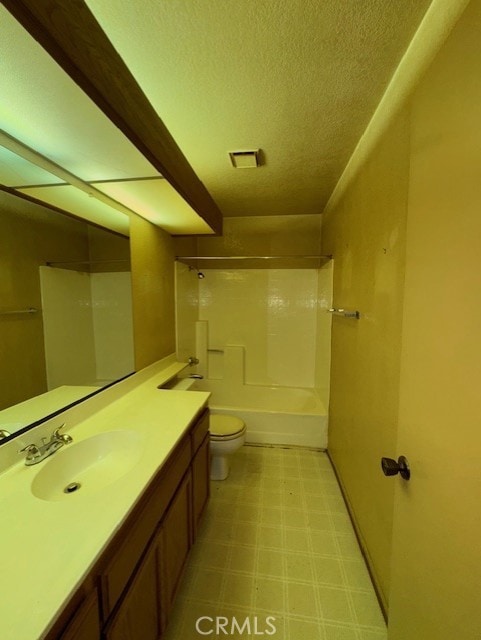 4773 Mount Rainier St, Jurupa Valley, CA 92509 - full bath featuring tile patterned floors, vanity, washtub / shower combination, and a textured ceiling